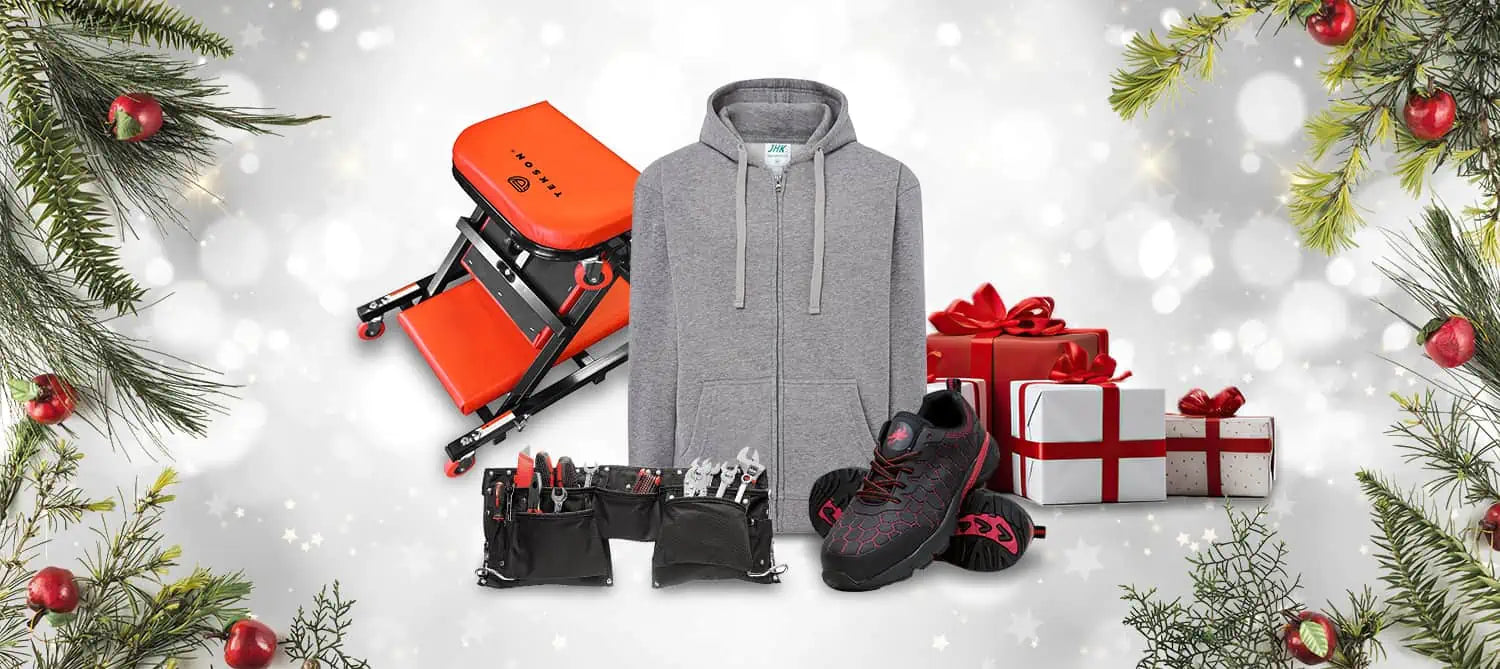 Praktische Weihnachtsgeschenke, die Sie im MERKOL-Shop kaufen können: Sweatshirt, Stiefel, Werkstattliege und Werkzeuggürtel. Ein Bild der festlichen Atmosphäre.